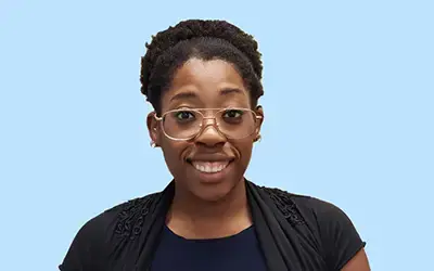 African American woman with glasses with smiling