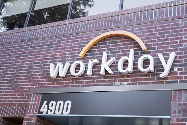 brick and glass window office front with workday sign